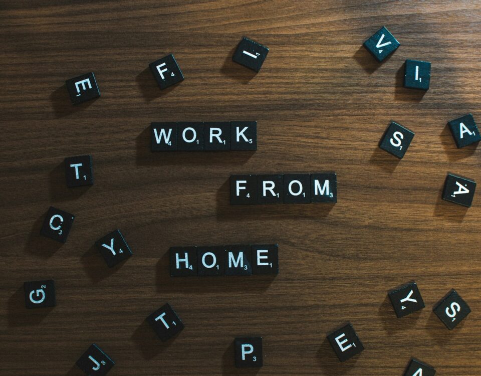 a wooden table topped with scrabbled letters